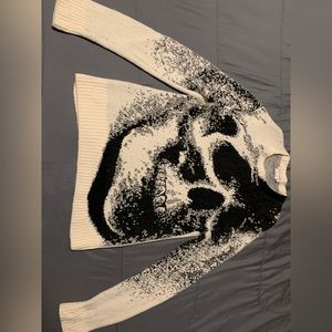 This is a Alexander McQueen crew neck skeleton sweater